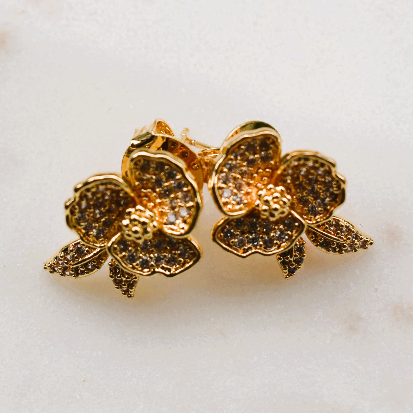 Gold Floral Stud Earrings with Rhinestone Detailing